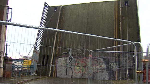 Fences in front of bridge