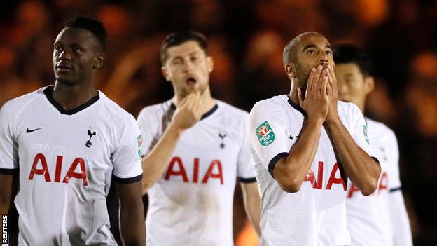 Tottenham look dejected after losing to Colchester