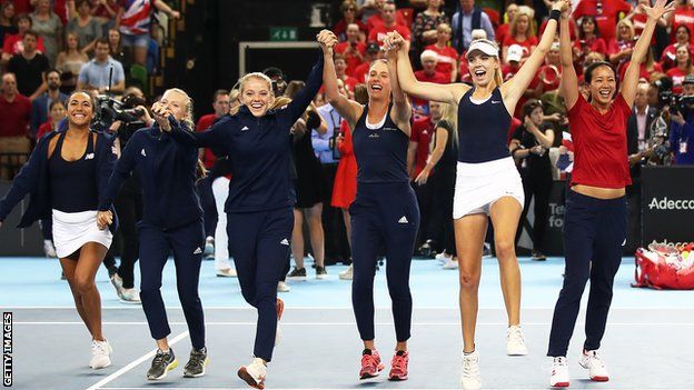 Team GB Katie Boulter, Katie Swan, Johanna Konta, Harriet Dart, Heather Watson and captain Anne Keothavong of Great Britain after defeating Kazakhstan during the Fed Cup World Group II Play-Off match between Great Britain and Kazakhstan at Copper Box Arena on April 21, 2019 in London, England.