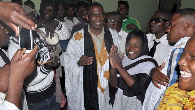 Mauritania anti-slavery activist Biram Ould Dah Ould Abeid (C) is welcomed by supporters