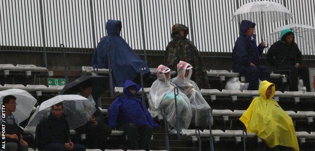 Fans in rain