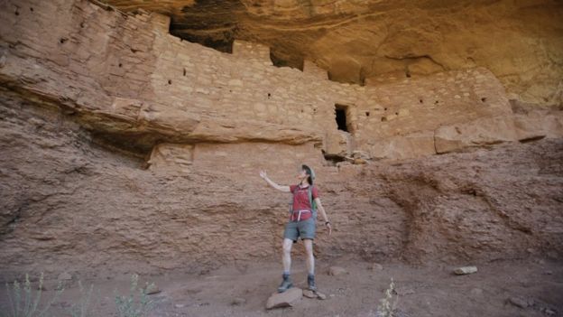 Interior Secretary Sally Jewell hikes among the cliff dwellings known as the Moonhouse