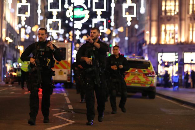 % Searching for the 'angel' who held me on Westminster Bridge Armed police on Oxford Street
