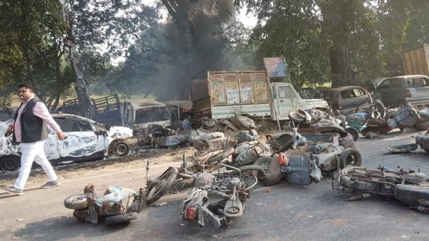 Burnt motorcycles and vehicles on the street