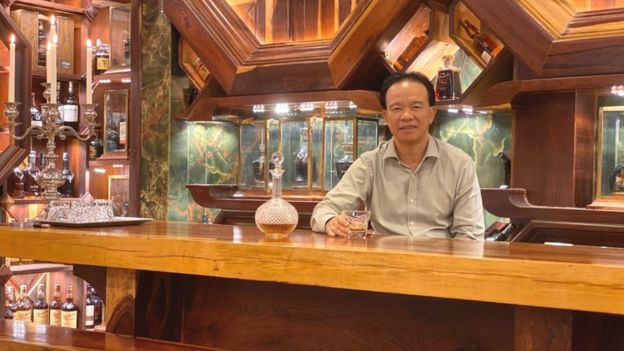 Mr Viet Nguyen Dinh Tuan with his whisky collection