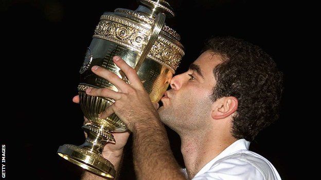 Pete Sampras kisses the Wimbledon trophy after his 2000 triumph