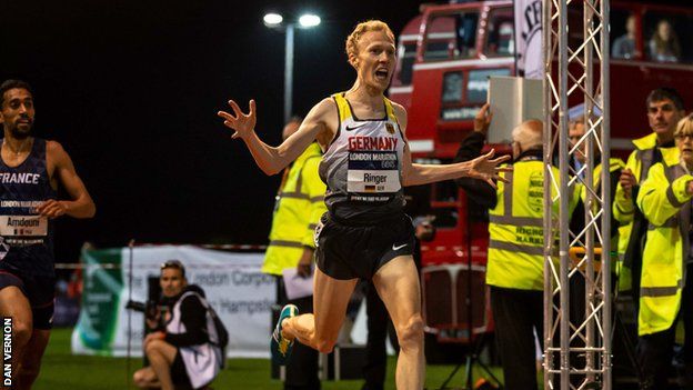Germany's Richard Ringer celebrates as he crosses the finish line first in the Night of the 10,000m PB's in 2018