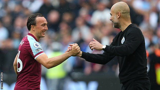 Mark Noble shared a private word with Manchester City manager Pep Guardiola at full time