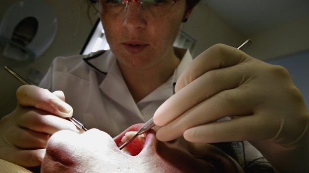Dental patient being treated