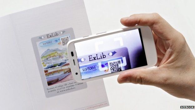 Smartphone scanning e-book QR code