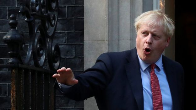 Boris Johnson standing outside Number 10 Downing Street