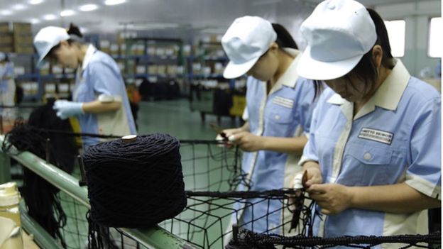 Employees knit knotless nets during processing at a Nitto Seimo Co factory in Fukuyama, Hiroshima (06 September 2016)