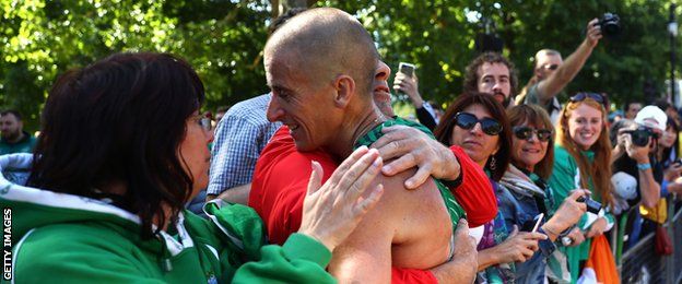 Robert Heffernan is embraced by family and friends and Sunday's race