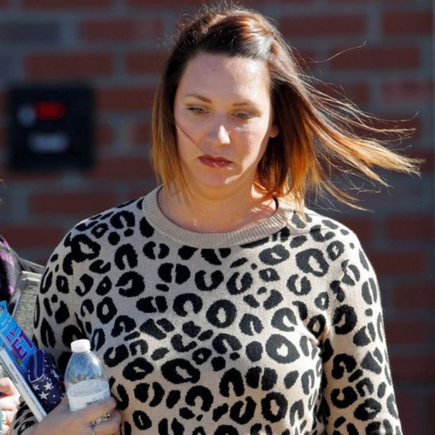 Shannon Allen, wife of former US Army Sergeant First Class Mark Allen, leaves court