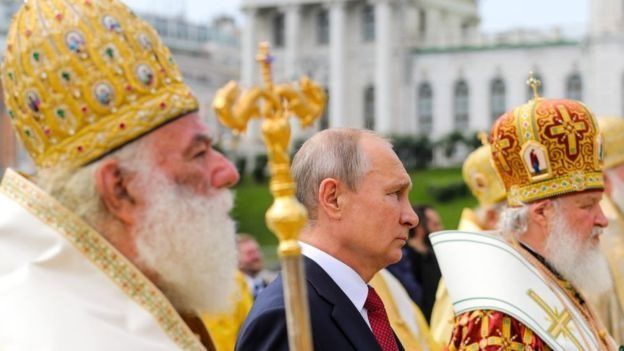 Getty Images / Феодор ІІ під час святкування річниці Хрещення Русі у Москві в 2018 році з Володимиром Путіним та головою РПЦ Кирилом