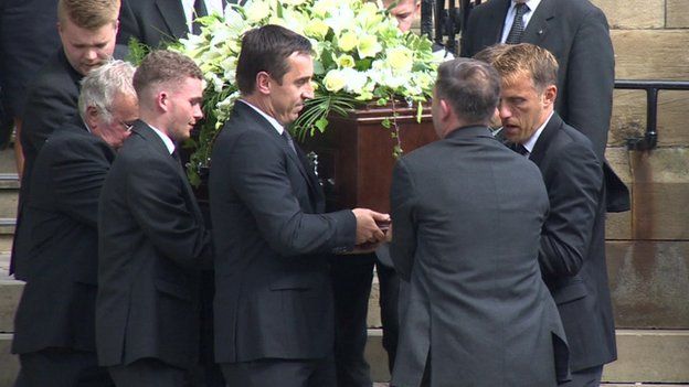 Gary and Phil Neville carry their father's coffin