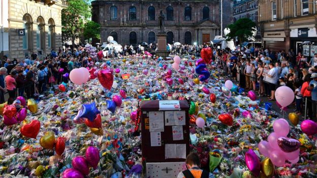 Balloons and floral tributes to the victims in Manchester's St Ann's Square