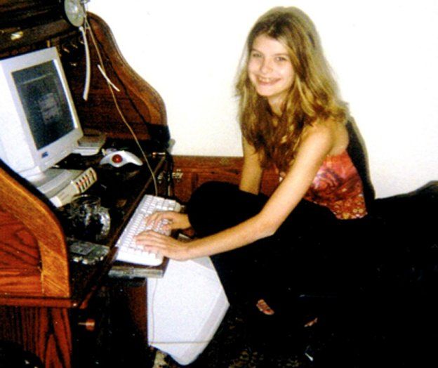 Alicia, age 13, at the family computer