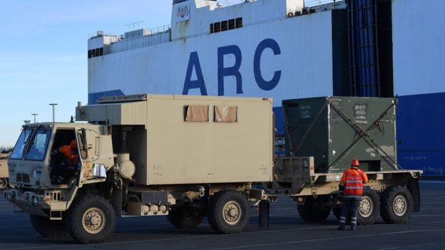 US Military vehicles are unloaded from a carrier ship in the harbour in Bremerhaven