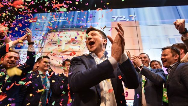 Ukrainian presidential candidate Volodymyr Zelensky reacts after winning the presidential election in April