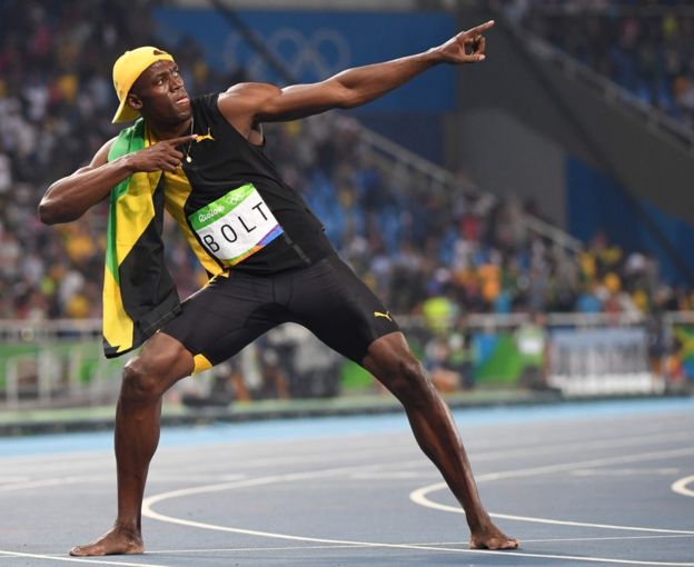 Usain Bolt en su pose de triunfo.