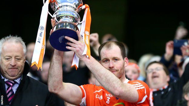 Ciaran McKeever lifts the Football League Division Three trophy in 2015 after Armagh beat Fermanagh in the final