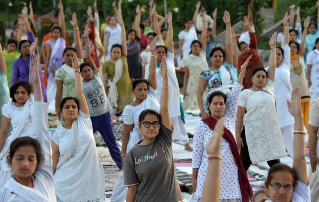 Indian women doing yoga