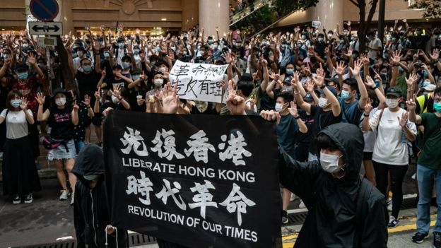 Demonstrators in Hong Kong take part in a protest against the new national security law