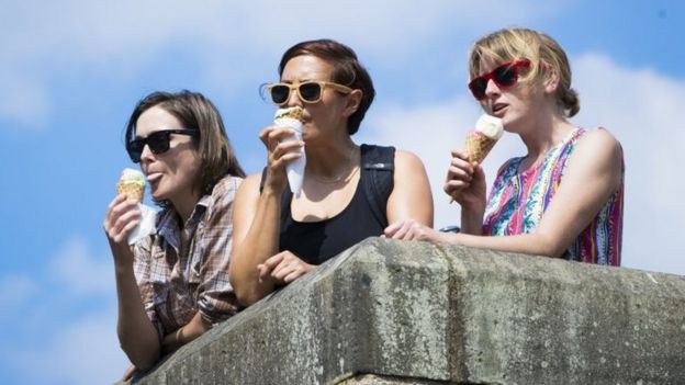 Women enjoying ice cream at Hebden Bridge, West Yorkshire