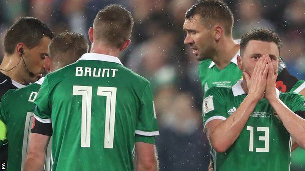Northern Ireland were stunned by referee Ovidiu Hategan 58th-minute penalty decision
