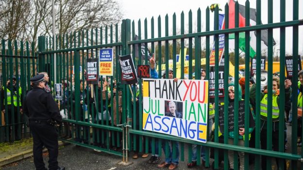 Demonstrators gather outside court