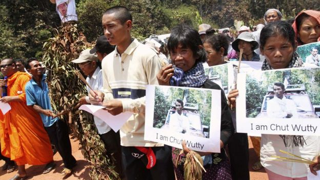 People march to the site where Cambodian anti-logging activist Chut Wutty was killed