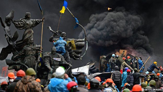 Anti-government protesters clash with the security forces in Independence Square in Kiev on 20 February