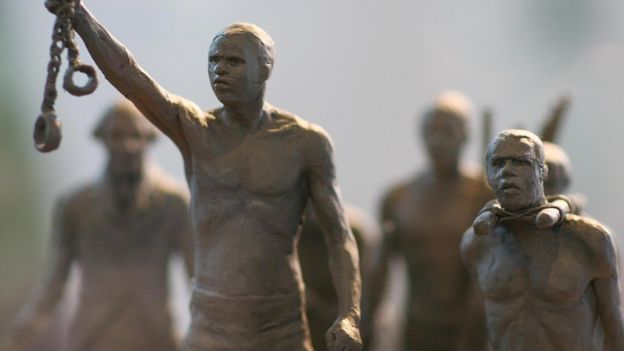 A maquette of a statue commemorating the enslaved Africans whose lives were lost during the slave trade is pictured as it is unveiled by Boris Johnson in central London, on August 18, 2008