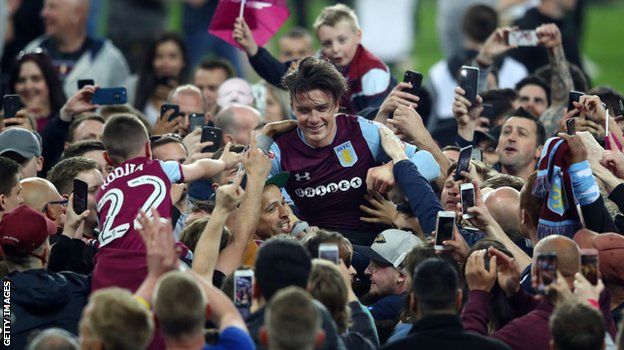 Jack Grealish celebrates with Aston Villa fans after last season's Championship play-off semi-final win over Derby County