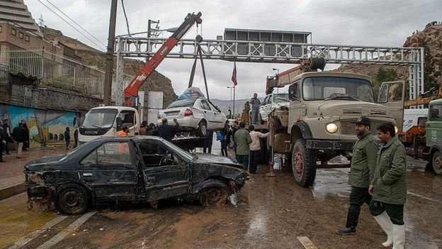 Damaged vehicles are seen after a flash flooding In Shiraz, Iran, March 25, 2019