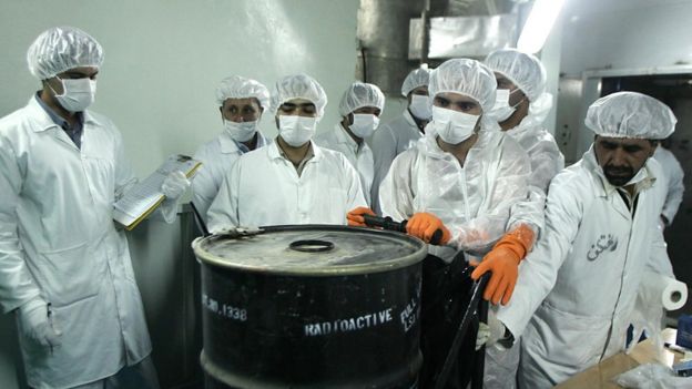 Workers at a uranium conversion facility in Iran, pictured in 2005