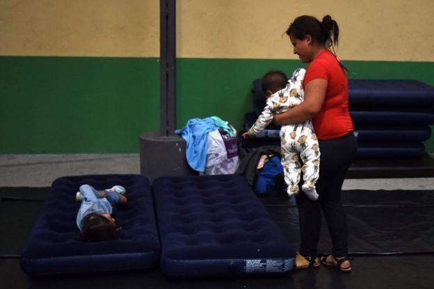 Honduran migrants heading to the United States rest at the Casa del Migrante (Migrant's House) in Guatemala City on October 17, 2018.