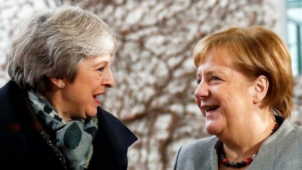 Theresa May and Angela Merkel in December