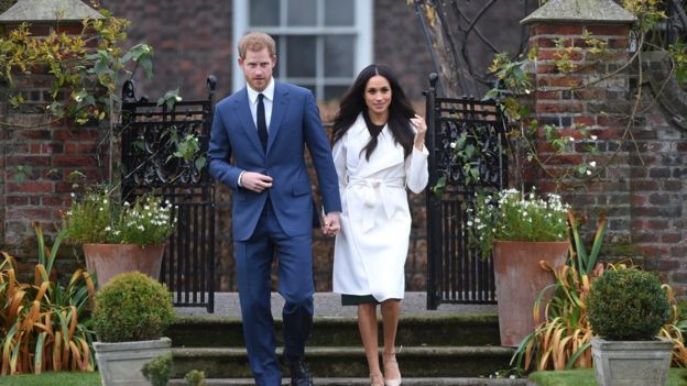 Prince Harry and Meghan Markle outside Kensington Palace