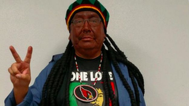 San Carlos Apache Tribe's leader Terry Rambler dressed in blackface as Bob Marley for Halloween