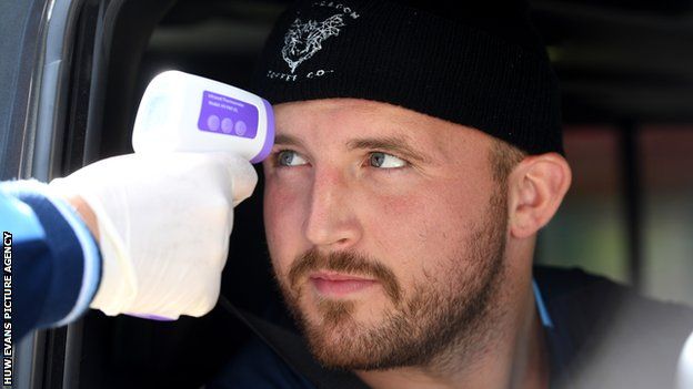 Wales prop Dillon Lewis has his temperature taken ahead of Cardiff Blues training