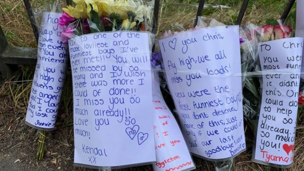 Written tributes at the scene