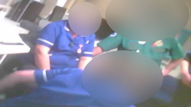 Two nurses and a paramedic with blurred out faces
