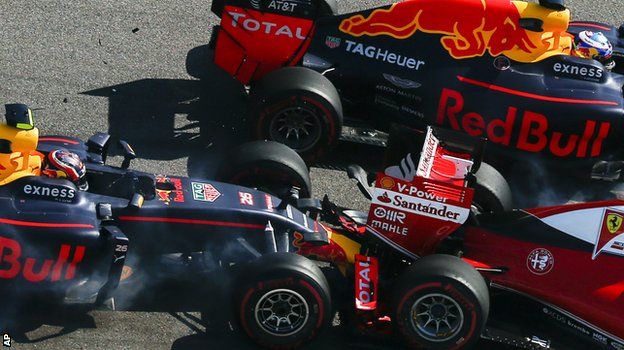 Daniil Kvyat crashes into Ferrari's Sebastian Vettel