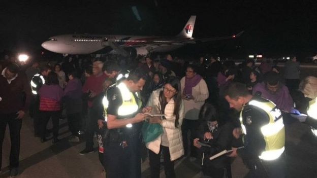 Passengers were evacuated on to the tarmac after a long wait