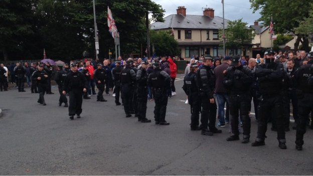 A heavy police presence remains in north Belfast