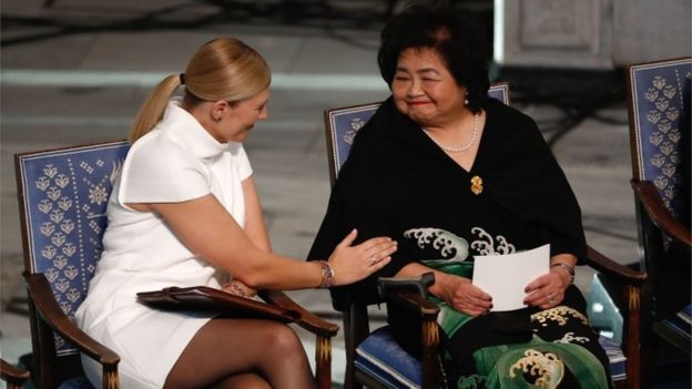 Beatrice Fihn (left), leader of Ican, talks with Hiroshima nuclear bombing survivor Setsuko Thurlow at the city hall in Oslo, Norway, during the award ceremony of the 2017 Nobel Peace Prize, 10 December 2017