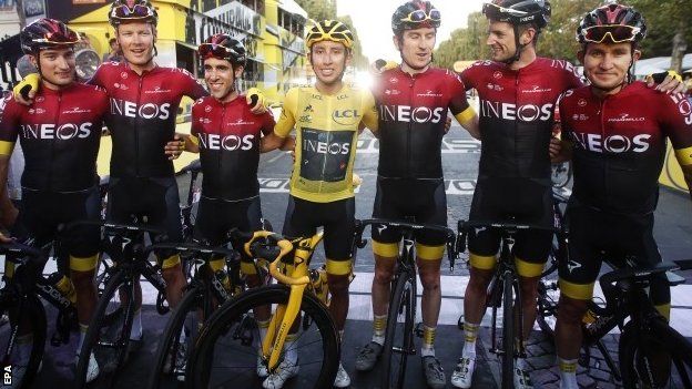 Egan Bernal with Ineos team-mates on the finish line in Paris
