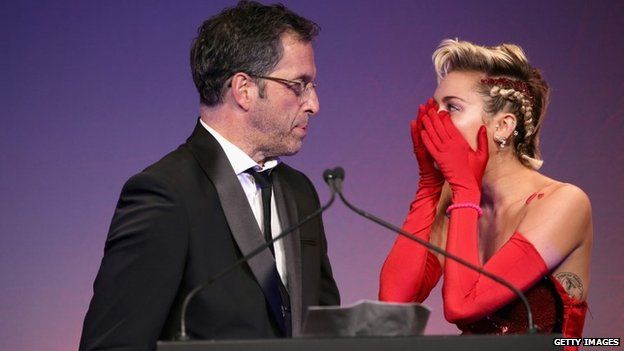 Kenneth Cole (left) with Miley Cyrus